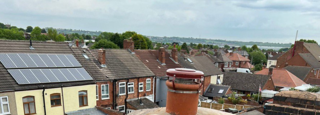 This is a photo taken from a roof which is being repaired by LS Roofing Amersham, it shows a street of houses, and their roofs