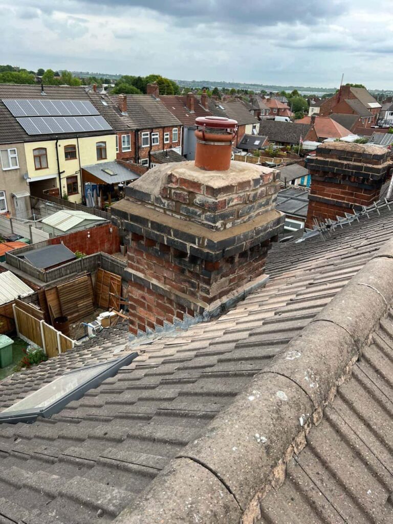 This is a photo taken from a roof which is being repaired by LS Roofing Amersham, it shows a street of houses, and their roofs